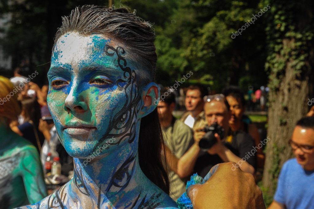 Nude artists during first official Body Painting Event Stock