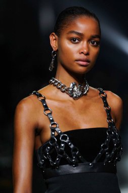 MILAN, ITALY - FEBRUARY 23: A model walks the runway at the Roberto Cavalli fashion show during the Milan Fashion Week Fall/Winter 2022/2023 on February 23, 2022 in Milan, Italy.