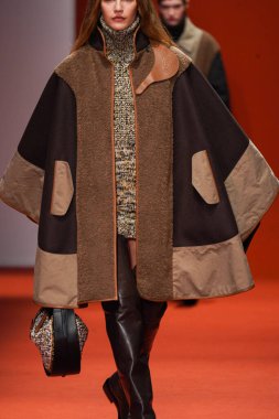 MILAN, ITALY - FEBRUARY 25: A model walks the runway at the Tod's fashion show during the Milan Fashion Week Fall/Winter 2022/2023 on February 25, 2022 in Milan, Italy.