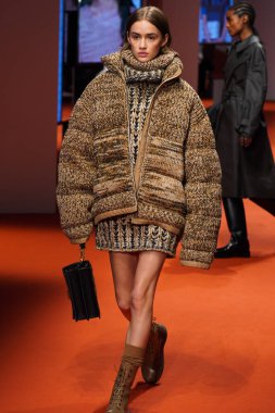 MILAN, ITALY - FEBRUARY 25: A model walks the runway at the Tod's fashion show during the Milan Fashion Week Fall/Winter 2022/2023 on February 25, 2022 in Milan, Italy.
