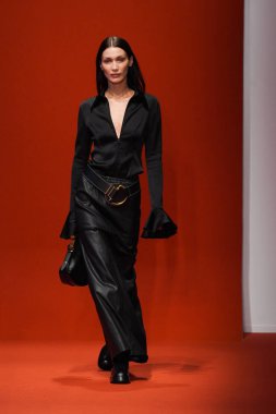 MILAN, ITALY - FEBRUARY 25: Bella Hadid walks the runway at the Tod's fashion show during the Milan Fashion Week Fall/Winter 2022/2023 on February 25, 2022 in Milan, Italy.