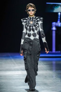 MILAN, ITALY - FEBRUARY 24: A model walks the runway at the Annakiki fashion show during the Milan Fashion Week Fall/Winter 2022/2023 on February 24, 2022 in Milan, Italy.