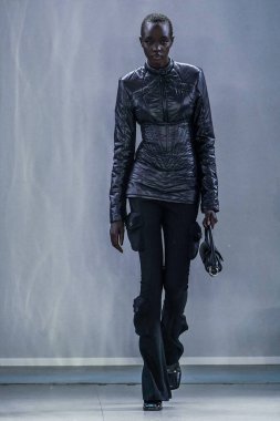 MILAN, ITALY - FEBRUARY 26: A model walks the runway at the Trussardi fashion show during the Milan Fashion Week Fall/Winter 2022/2023 on February 26, 2022 in Milan, Italy.
