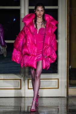 MILAN, ITALY - FEBRUARY 26: A model walks the runway at the Ermanno Scervino fashion show during the Milan Fashion Week Fall/Winter 2022/2023 on February 26, 2022 in Milan, Italy.