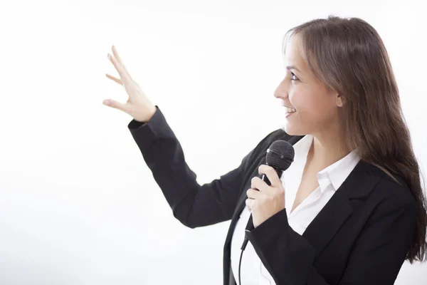 Business woman holding microphone — Stock Photo, Image