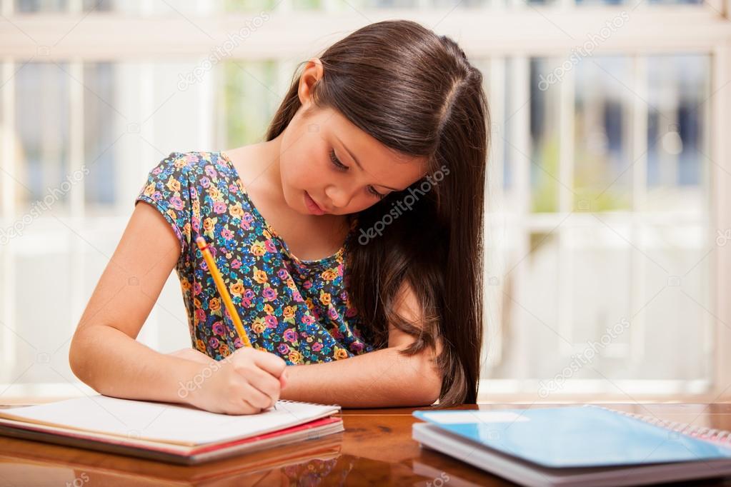 A little girl doing her homework