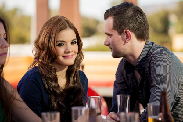 Young man flirting with brunette — Stock Photo, Image