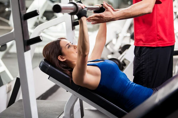 Girl with barbell — Stock Photo, Image