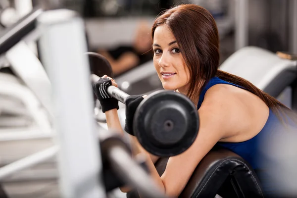 Girl with barbell Royalty Free Stock Images