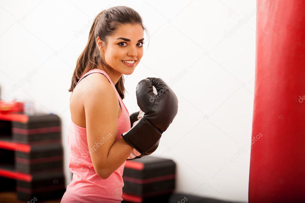 The girl is engaged in boxing