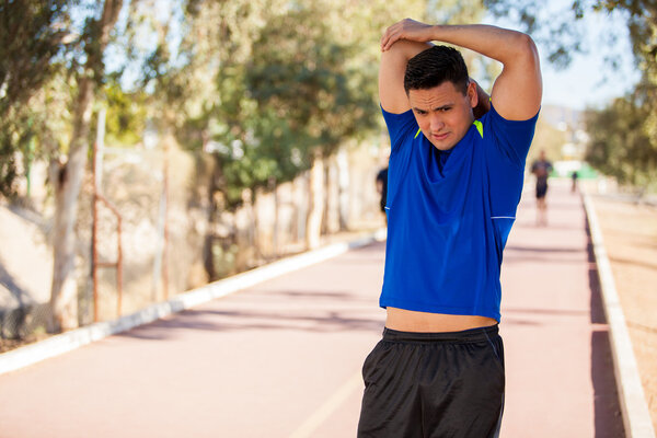 Runner warming up and stretching