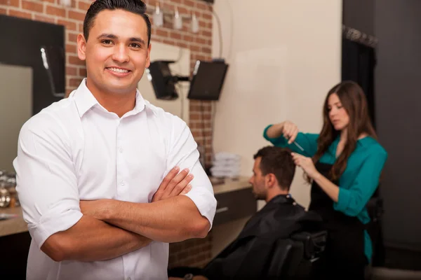 Business owner in his shop — Stock Photo, Image