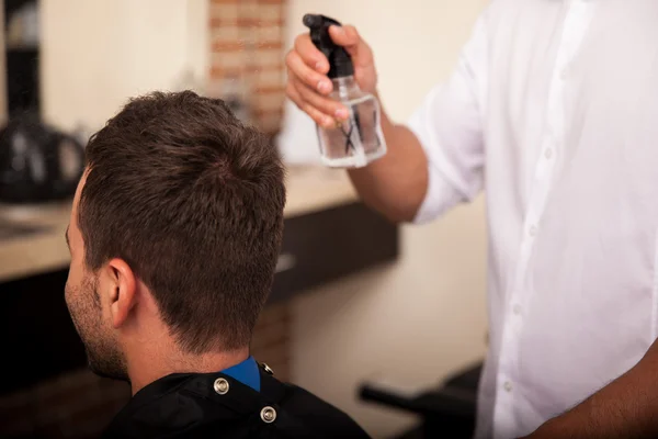 Getting haircut in a barber shop — Stock Photo, Image