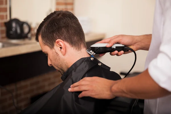 Cutting hair at a salon — Stock Photo, Image