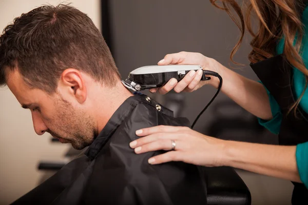 Getting haircut at a salon — Stock Photo, Image