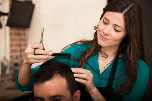 Happy hairstylist at work — Stock Photo, Image