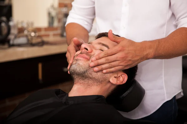 Giving a face massage — Stock Photo, Image