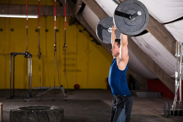 Strong man working out — Stock Photo, Image