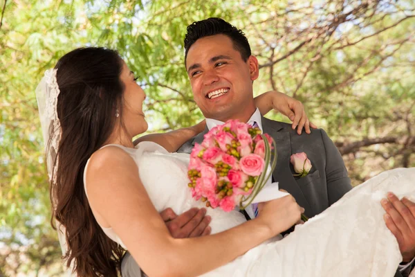 Bride and groom behind her — Stock Photo, Image