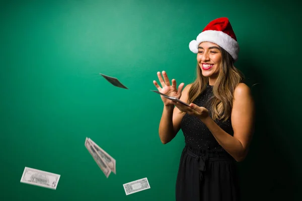 Spending Lot Money Excited Hispanic Woman Christmas Hat Throwing Cash — Stock Photo, Image
