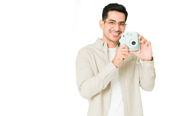 Love Taking Pictures Cheerful Hispanic Man Showing His New Instant — Stock Photo, Image