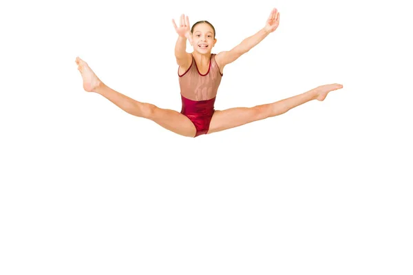 Nadšený Sportovní Gymnastka Usmívá Při Skákání Dělá Nohu Roztřepenou Veselá — Stock fotografie