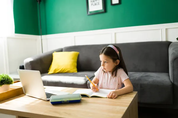 Smart Preschool Kid Taking Notes Notebook While Listening Her Online — Stock Photo, Image