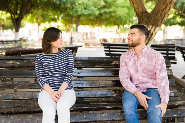 Attractive Young Man Woman Flirting While Sitting Bench Park Talking — Stock Photo, Image
