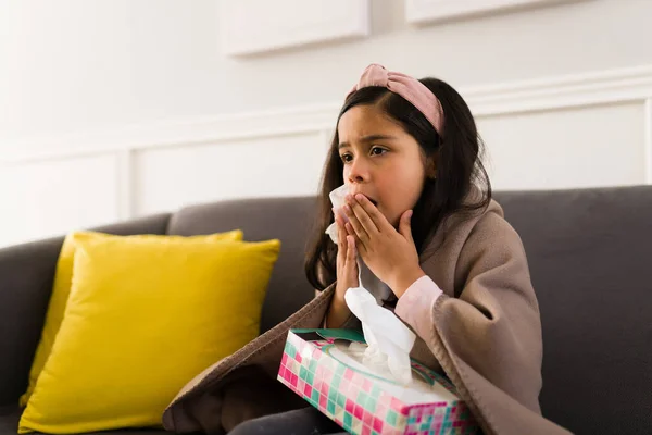 Elementary Girl Covered Blanket Sneezing Latin Girl Sick Cold Using — Stock Photo, Image