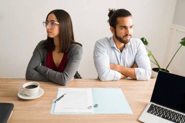 Angry couple suffering from relationship problems. Unhappy woman and man want to get a legal divorce 