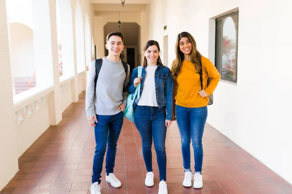 Portrait Happy Multiracial Young Students Smiling While Standing University Hallway — Fotografia de Stock
