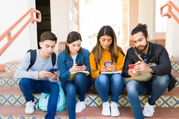 Diverse Group Friends Sitting University Stairs Texting Finishing Classes — Fotografia de Stock