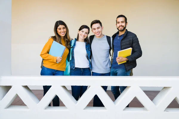 Portrait Attractive Smiling Students Embracing Looking Camera College Campus — Fotografia de Stock
