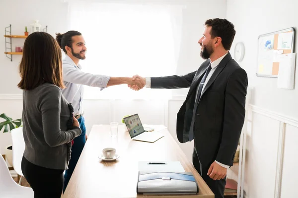 Beautiful Happy Couple Shaking Hands Lawyer His Office Professional Attorney — Stockfoto