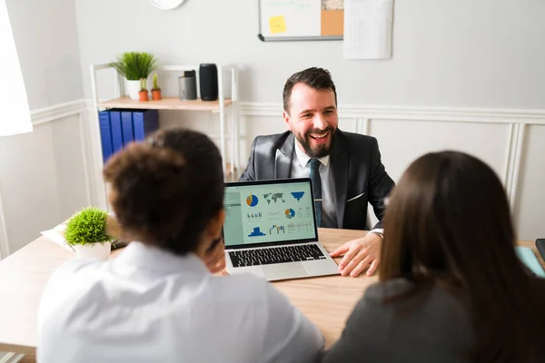 Cheerful Accountant Showing Investments Budgets Credit Loans Clients Laptop — Stok fotoğraf