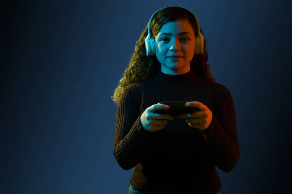 Beautiful Female Gamer Enjoying Playing Fun Video Game Wireless Headphones — Foto Stock