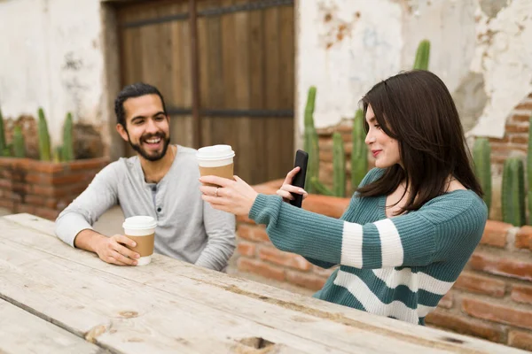 Cheerful Young Woman Enjoying Her Coffee Posting Picture Social Media — Stock Photo, Image