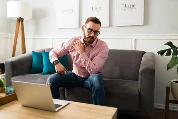 Sick Young Man Talking Virtual Doctor Video Call Pain His — Stock Photo, Image