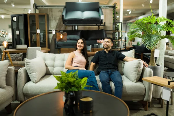 Cheerful Newlywed Couple Smiling While Trying Couch New House Young — Stock Photo, Image
