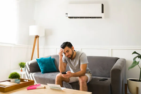 Upset Man Sweating Heat Wave Summer While Home Cold Unit — Stok fotoğraf