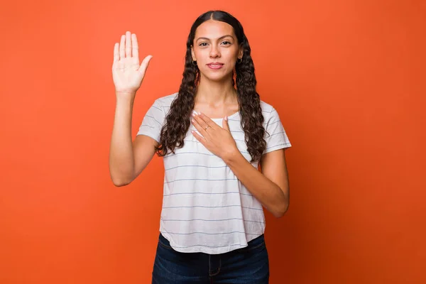 Loyal Young Woman Putting Her Palm Hand Her Chest While — Stock Photo, Image