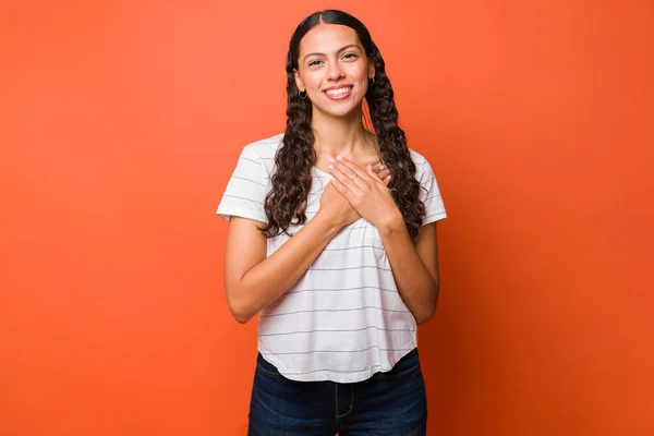 Attractive Woman Smiling Saying Thank You While Putting Her Hands — Foto Stock