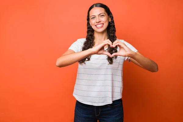 Studio Shot Beautiful Hispanic Woman Making Heart Her Hands Spreading — Stock Photo, Image