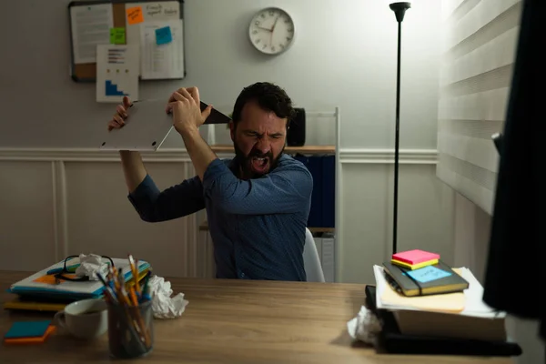 Stressed Overworked Man Breaking His Laptop While Feeling Angry His — Foto de Stock