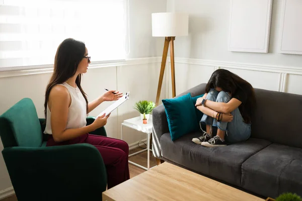 Sad Girl Dealing Depression Hugging Her Knees Crying While Listening — Stock Photo, Image