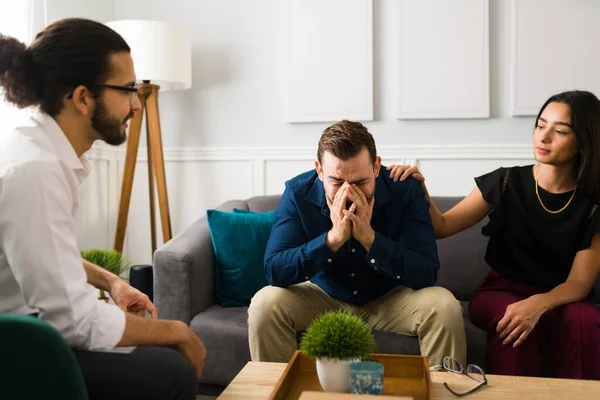 Sad Man Crying While His Wife Comforts Him Couples Therapy — Photo