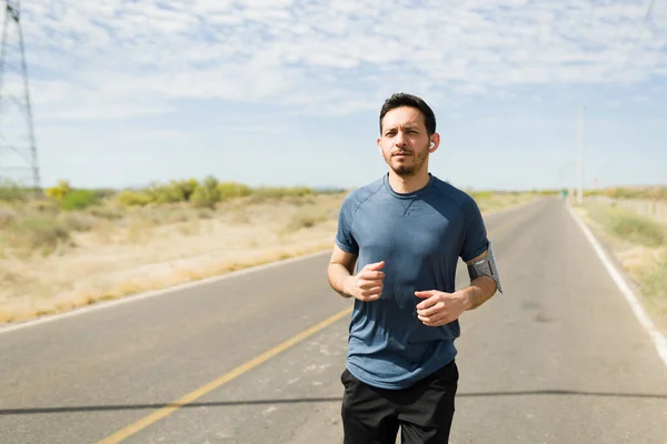 Handsome Young Man Running Alone Sunny Day Hispanic Man Exercising — Stok fotoğraf