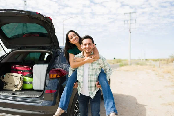 Portrait Attractive Young Man Piggybacking Woman While Stopping Side Road — Stock Fotó