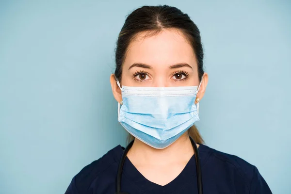 Beautiful Woman Brown Hair Medical Scrubs Wearing Face Mask Making — Stock Photo, Image