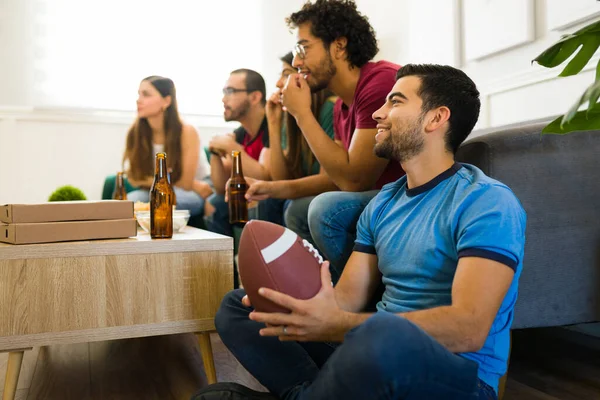 Handsome Man Holding Football Smiling While Hanging Out Friends Watching — Stock Photo, Image